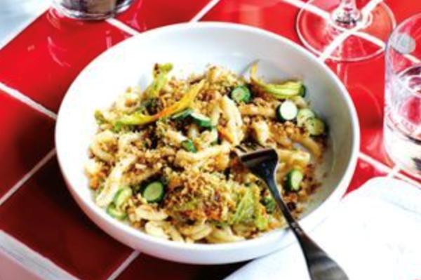 Strozzapreti with zucchini flowers and pangrattato
