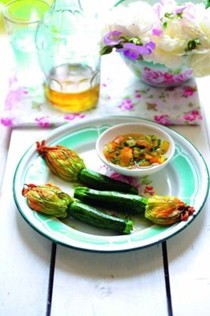Stuffed and roasted courgette flowers with sauce vierge