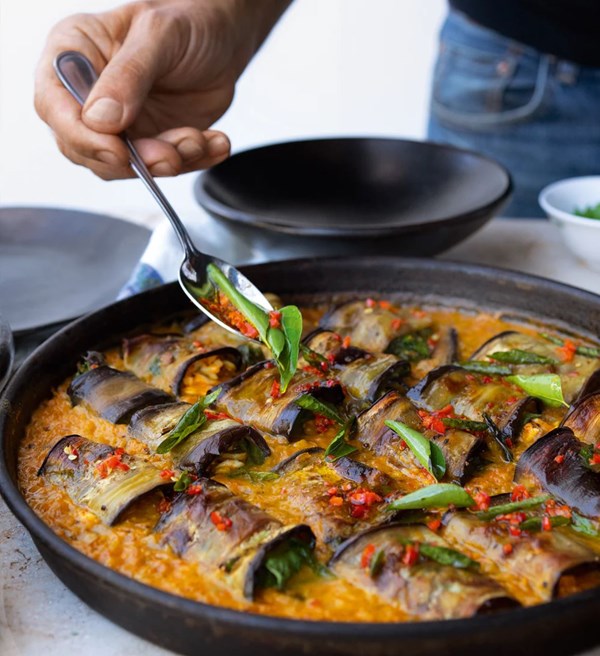 Stuffed aubergine in curry and coconut dal