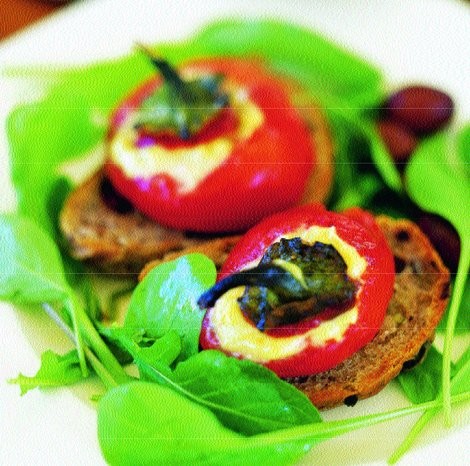 Stuffed baby capsicums on olive-bread croutons with rocket