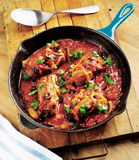 Stuffed beef rolls with tomato and olive sauce