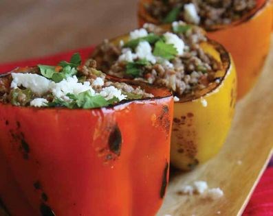 Stuffed bell peppers with ground beef and potatoes (Pimientos rellenos con picadillo)