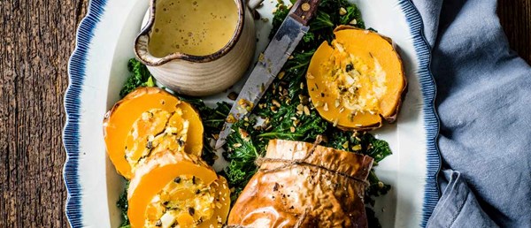 Stuffed butternut squash with cider cream sauce