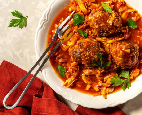 Stuffed cabbage with sweet-and-sour tomato sauce
