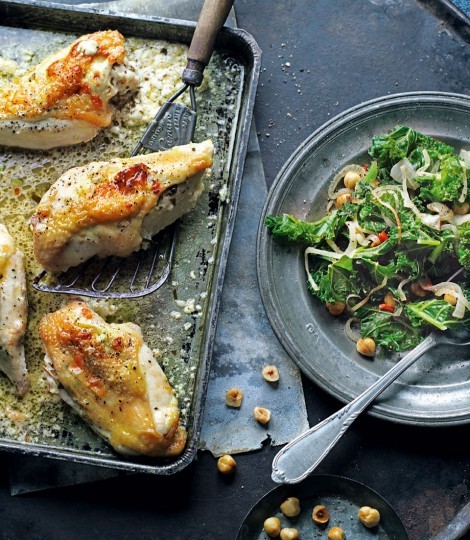 Stuffed chicken breasts with stir-fried kale and hazelnuts