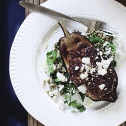 Stuffed eggplant with goat's cheese and lentil salad