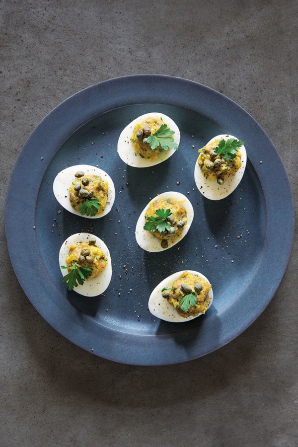 Stuffed eggs with anchovies, capers and parsley