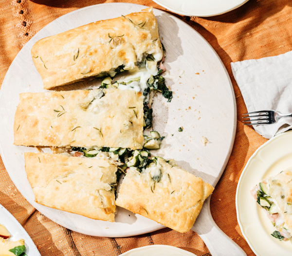 Stuffed focaccia with mortadella, escarole and Taleggio cheese