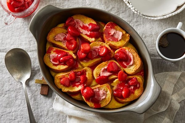 Stuffed French toast casserole with strawberry sauce