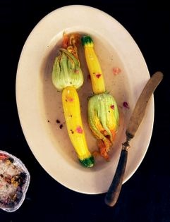 Stuffed, marinated zucchini blossoms with lavender salt