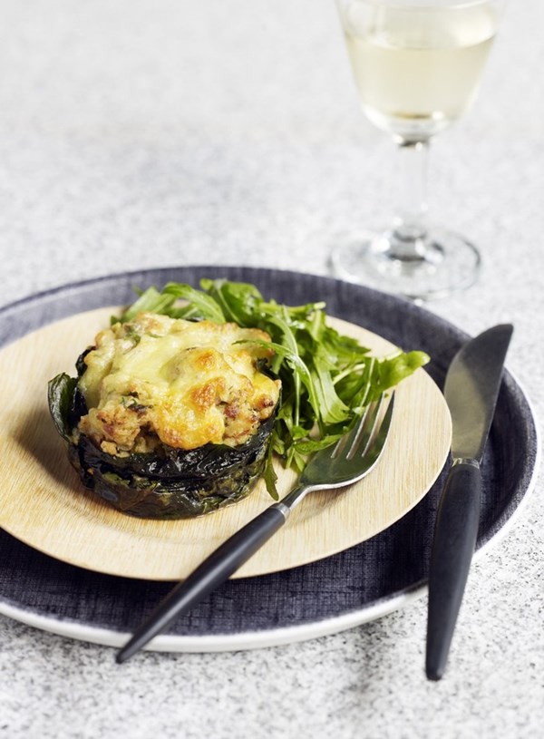 Stuffed mushrooms baked in silverbeet leaves