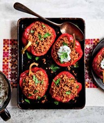 Stuffed peppers with bulgur & herb yogurt (Flafleh mahshi bil burghol)