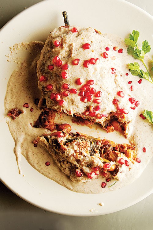 Stuffed poblano chiles with walnut sauce (Chiles en nogada)