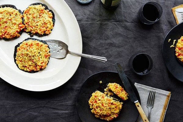 Stuffed portobello mushroom caps with roasted root vegetable risotto