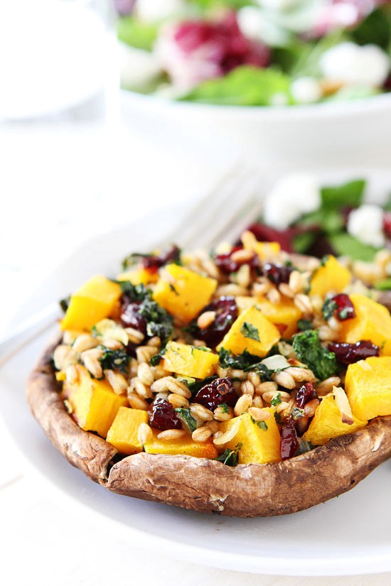 Stuffed portobello mushrooms with farro, butternut squash, and kale 