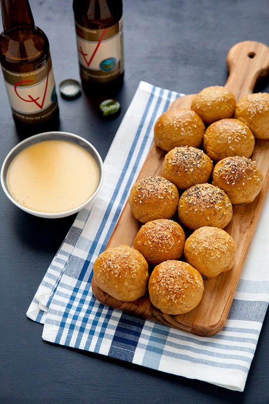 Stuffed pretzel rolls with beer cheese sauce