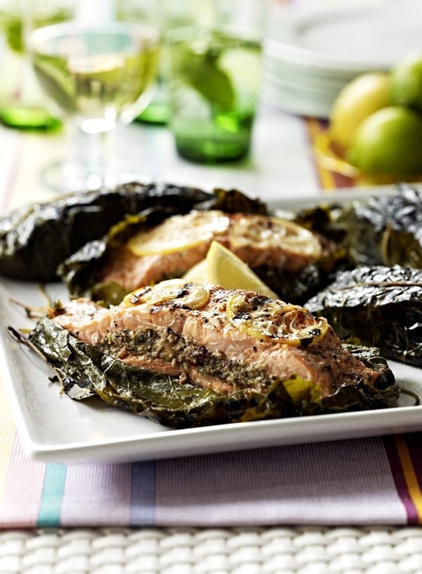 Stuffed salmon in vine leaves