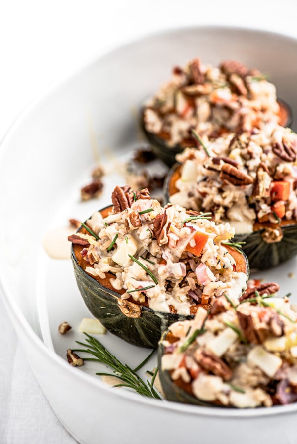 Stuffed squash with brown rice, pecans, and sage [tahini sauce]