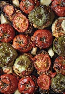 Stuffed summer vegetables with rice, farro, and pine nuts