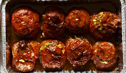 Stuffed tomatoes with rice, anchovy and herbs