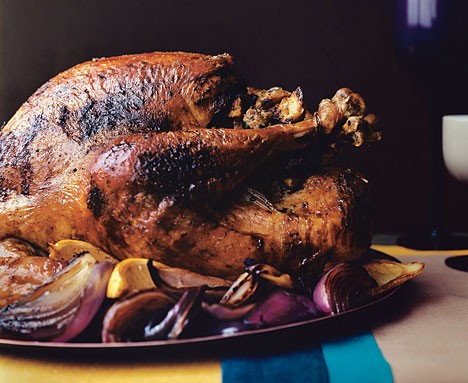 Stuffed turkey with lemon, oregano, and red onions