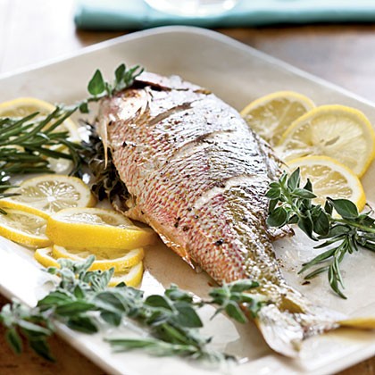 Stuffed whole roasted yellowtail snapper