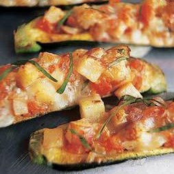 Stuffed zucchini with tomatoes and Jack cheese