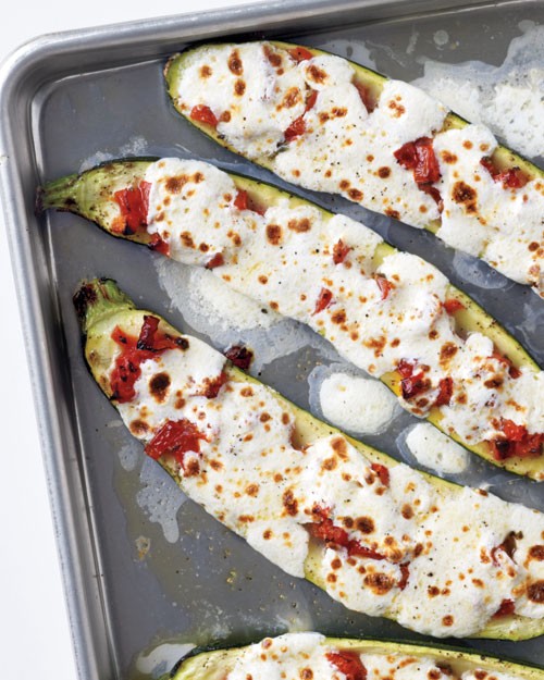 Stuffed zucchini with tomatoes and mozzarella