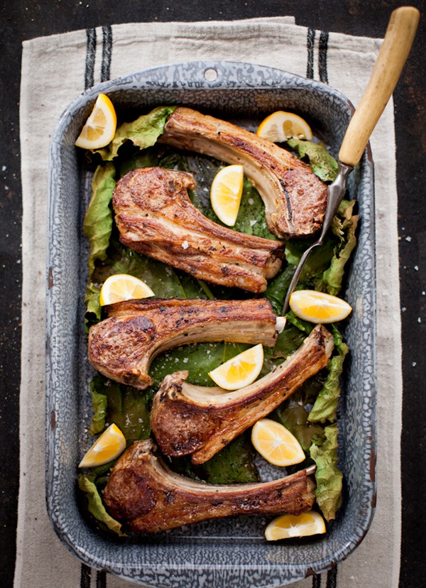 Succulent lamb chops nestled in fresh fig leaves & lemon cucumber tzatziki