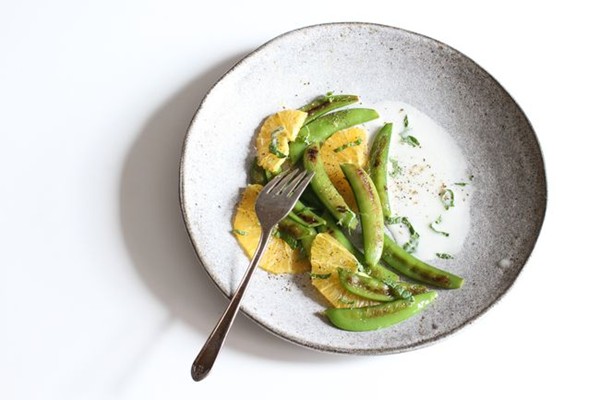 Sugar snap peas with mint and warm coconut dressing