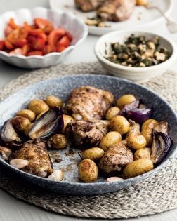 Sumac chicken with black gremolata & tomato salad