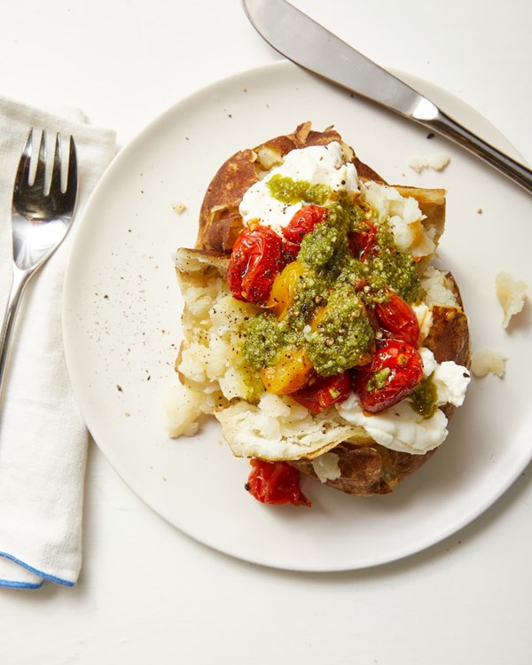 Summer baked potatoes with ricotta, blistered tomatoes & pesto