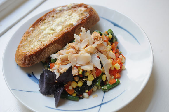 Summer corn and smoked trout dinner salad