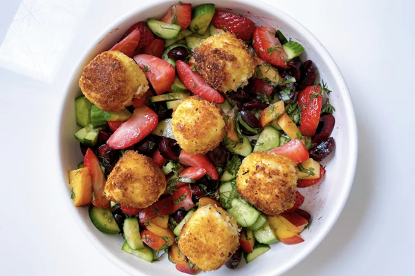 Summer fruit salad with fried goat cheese