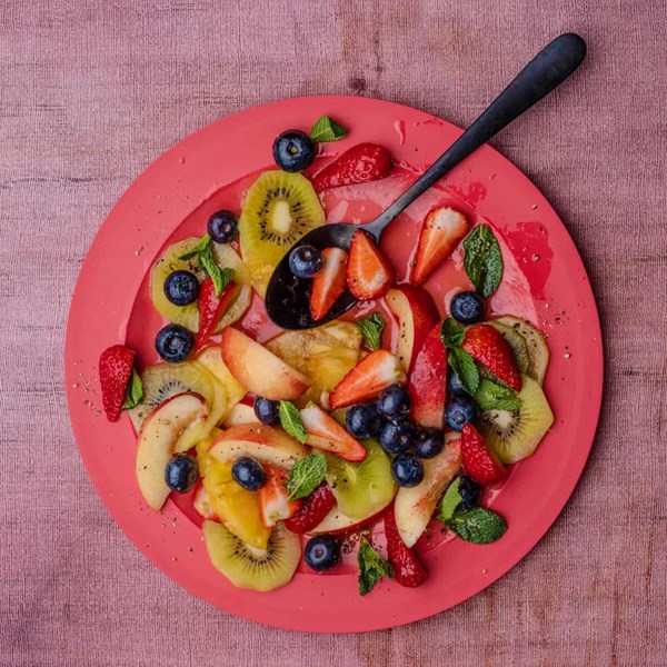 Summer fruit salad with mint and olive oil