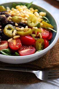 Summer grain bowls with corn, black beans, chiles, and arugula