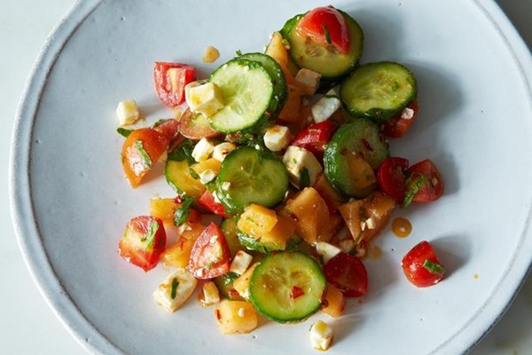 Summer melon salad with harissa, feta and mint