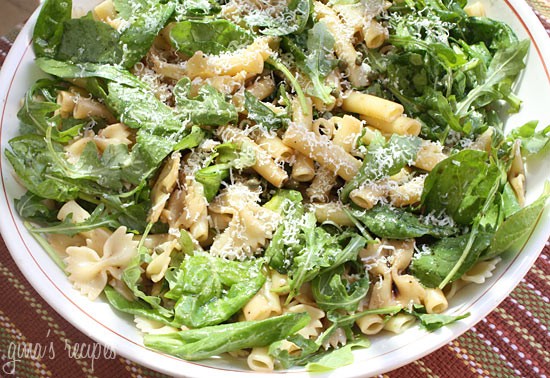 Summer pasta salad with baby greens
