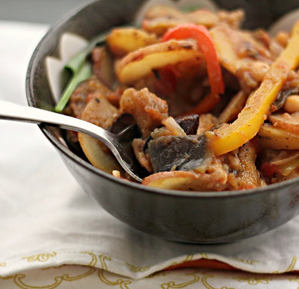 Summer potatoes stewed with eggplant, peppers and olives