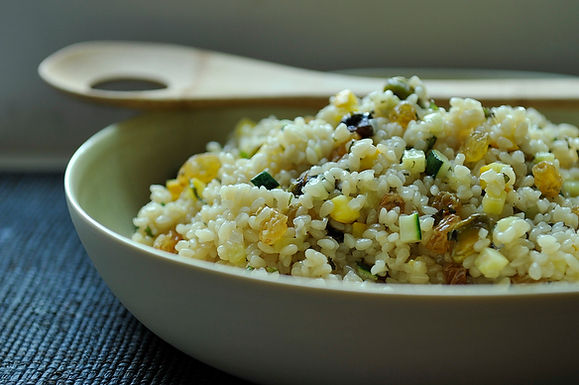 Summer squash couscous with sultanas, pistachios and mint