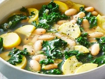 Summer squash soup with white beans and kale