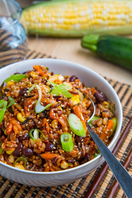 Summer vegetable bibimbap with corn, zucchini and black beans