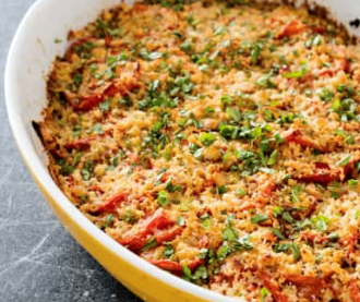 Summer vegetable gratin with roasted peppers and smoked mozzarella