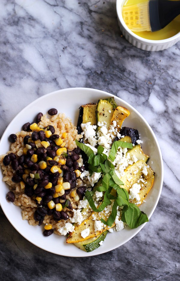 Summer vegetable stacks with black beans, corn, and goat cheese