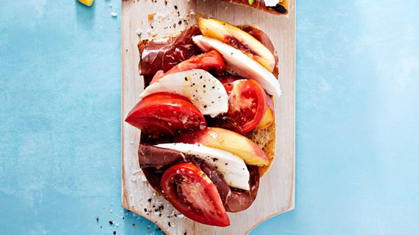 Summer vegetable tartines: tomato, peach, buffalo mozzarella, and bresaola
