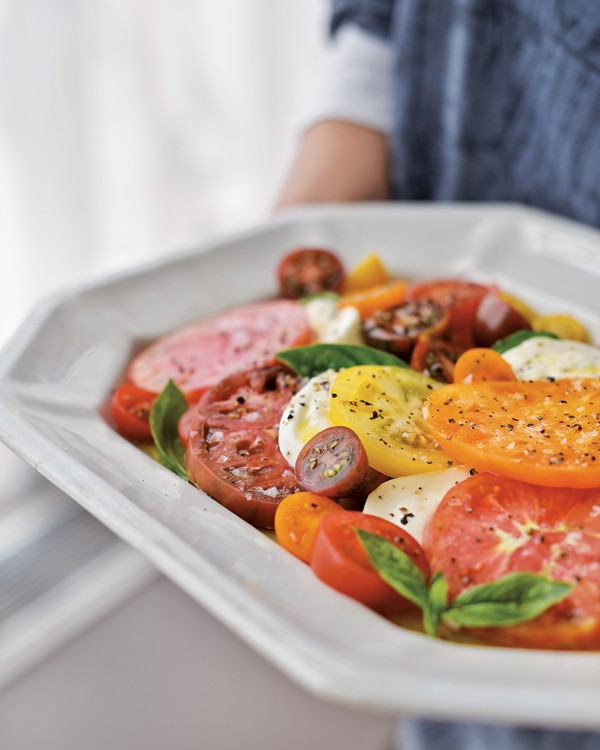 Summer's best tomatoes with burrata and basil