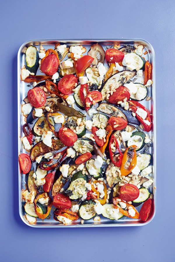 Summery roasted zucchini, eggplant & tomatoes with feta & pine nuts