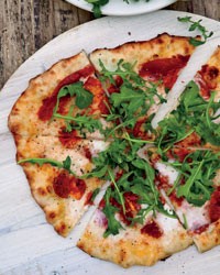 Sun-dried tomato and arugula pizza