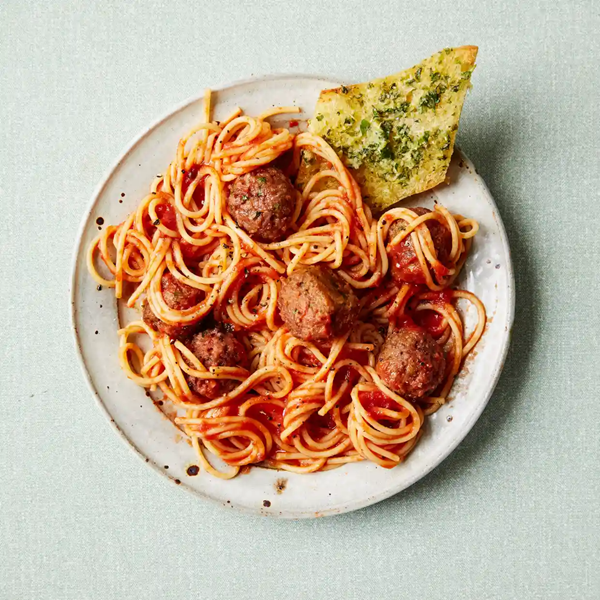 Sun-dried tomato 'meatballs' and herby garlic bread