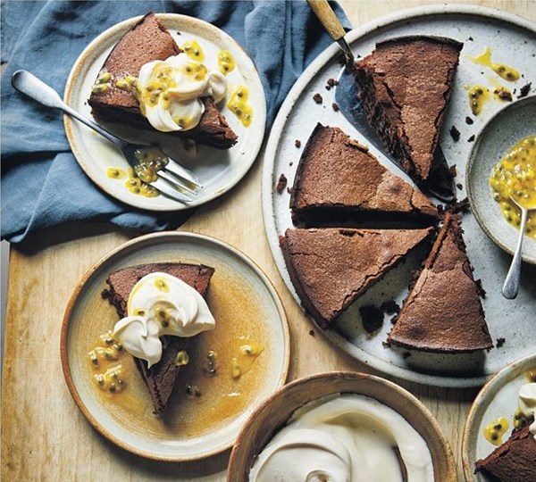 Sunken chocolate cake with passion fruit-rippled cream